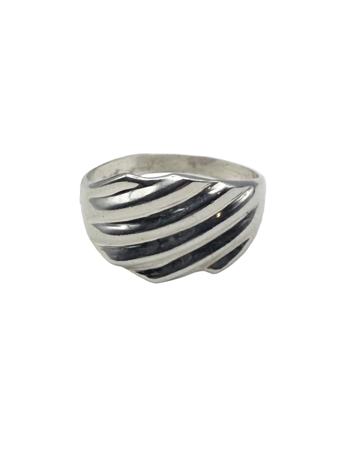 Silver ring with stripes on a white surface