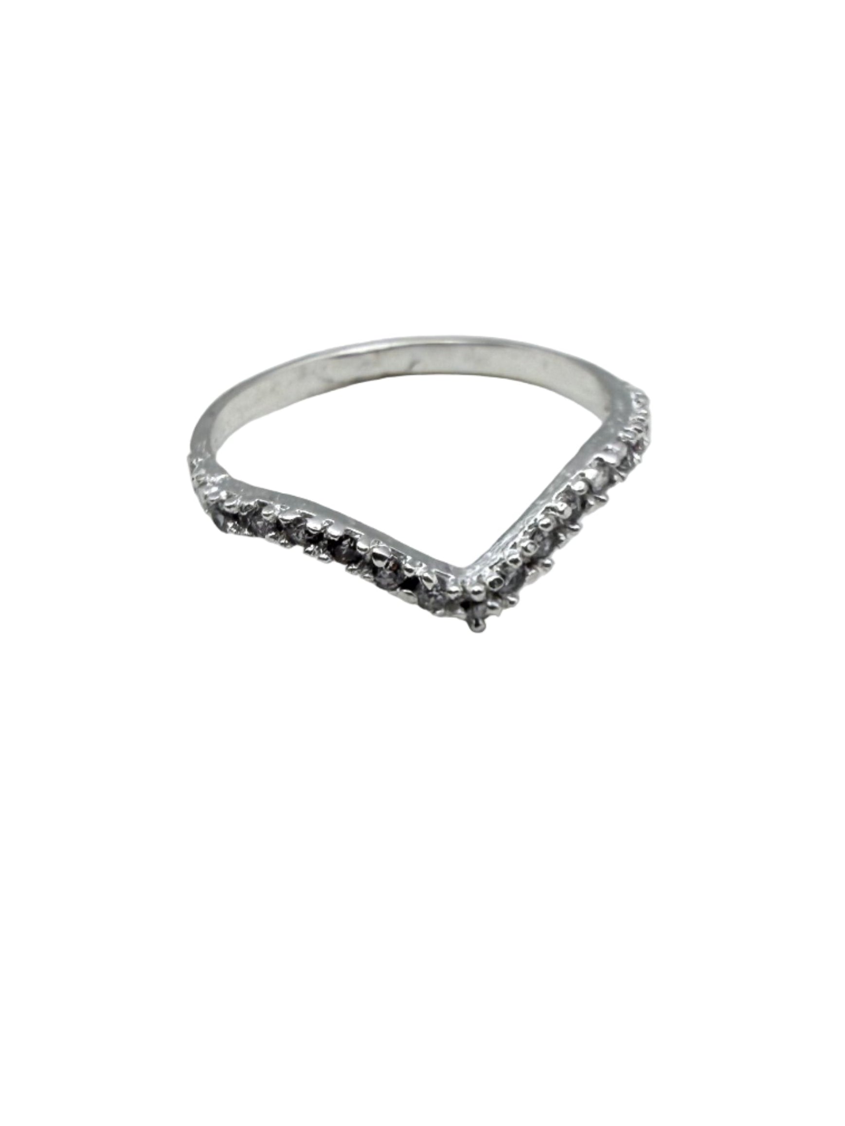 Silver ring with small stones on a white background