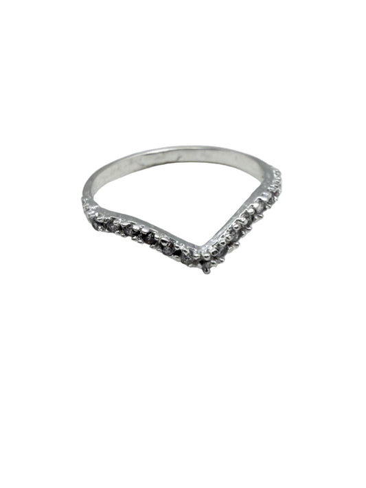 Silver ring with small stones on a white background